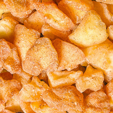 Apple pieces coated with cinnamon and sugar